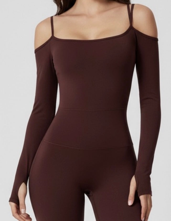 Brown long-sleeve jumpsuit on a plain background