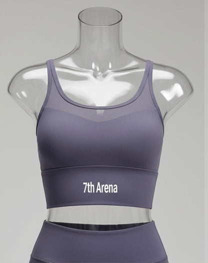 Purple sports bra with '7th Arena' branding on a mannequin against a gray background