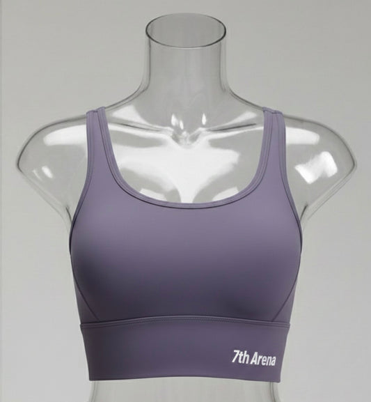 Purple sports bra on a mannequin with '7th Arena' branding against a gray background