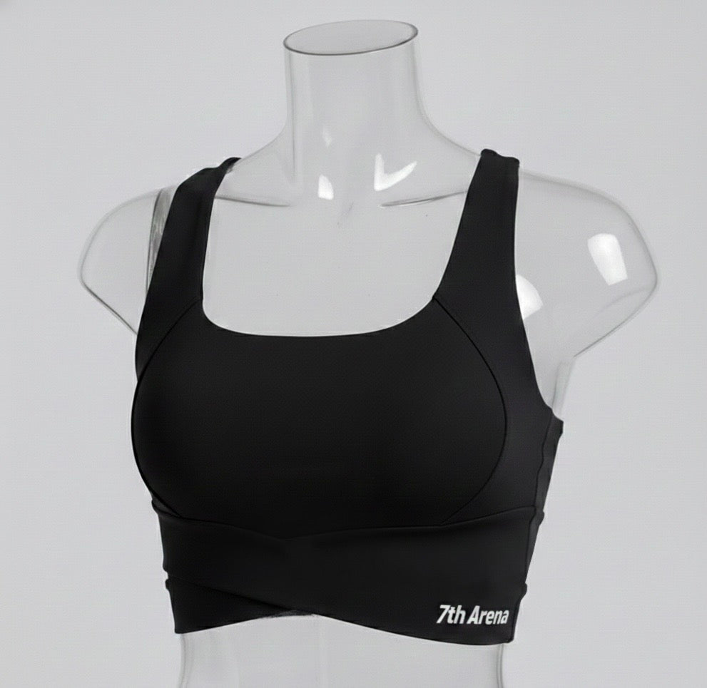 Black sports bra on a mannequin with '7th Arena' branding against a white background