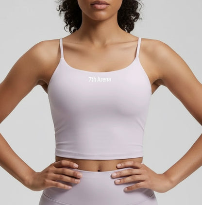 Person wearing a light purple sports bra with '7th Arena' branding on a light gray background