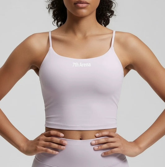 Person wearing a light purple sports bra with '7th Arena' branding on a light gray background