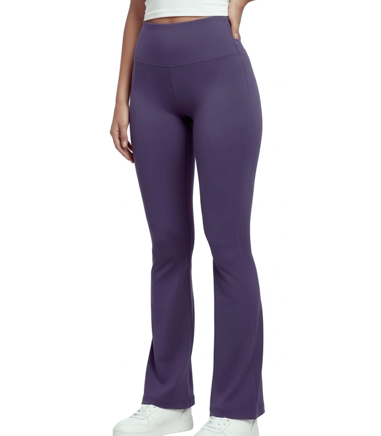 Purple flare leggings worn by a person on a white background