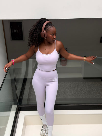 Person wearing a light purple set